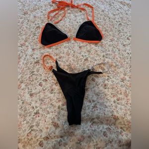 Swimsuit. Bikini black and orange
